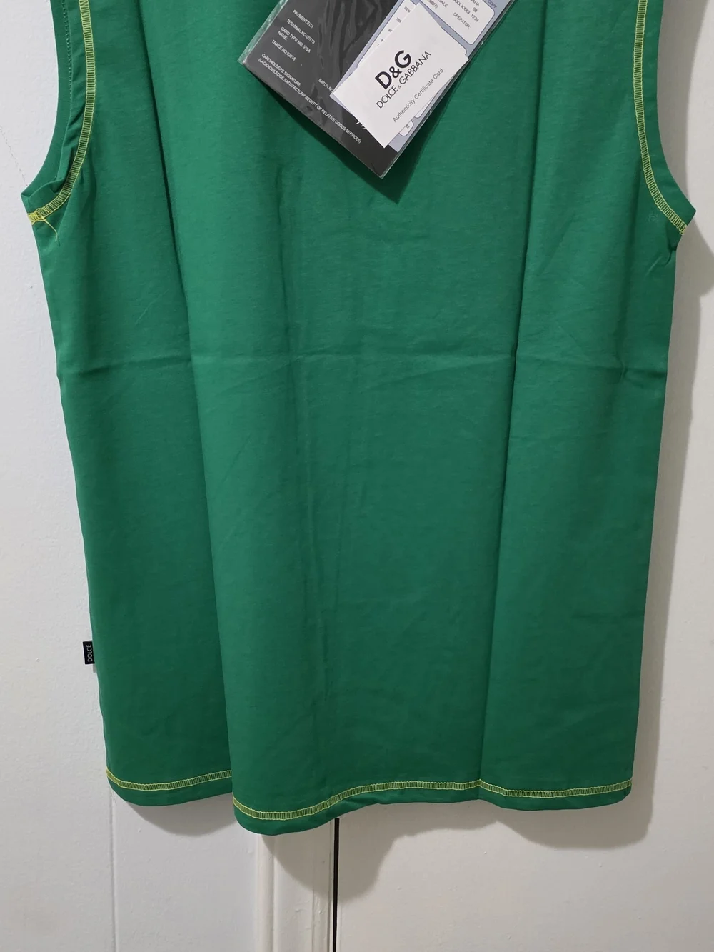 DC Green Sleeveless Tee with Yellow and Brown Logo